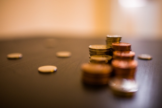 coins on a table copyright @ pexels.com